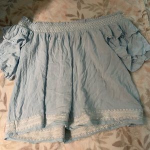 Off the shoulder light blue shirt